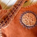 Russet Brown Suede Hobo Messenger Bag with Crochet Detailing.