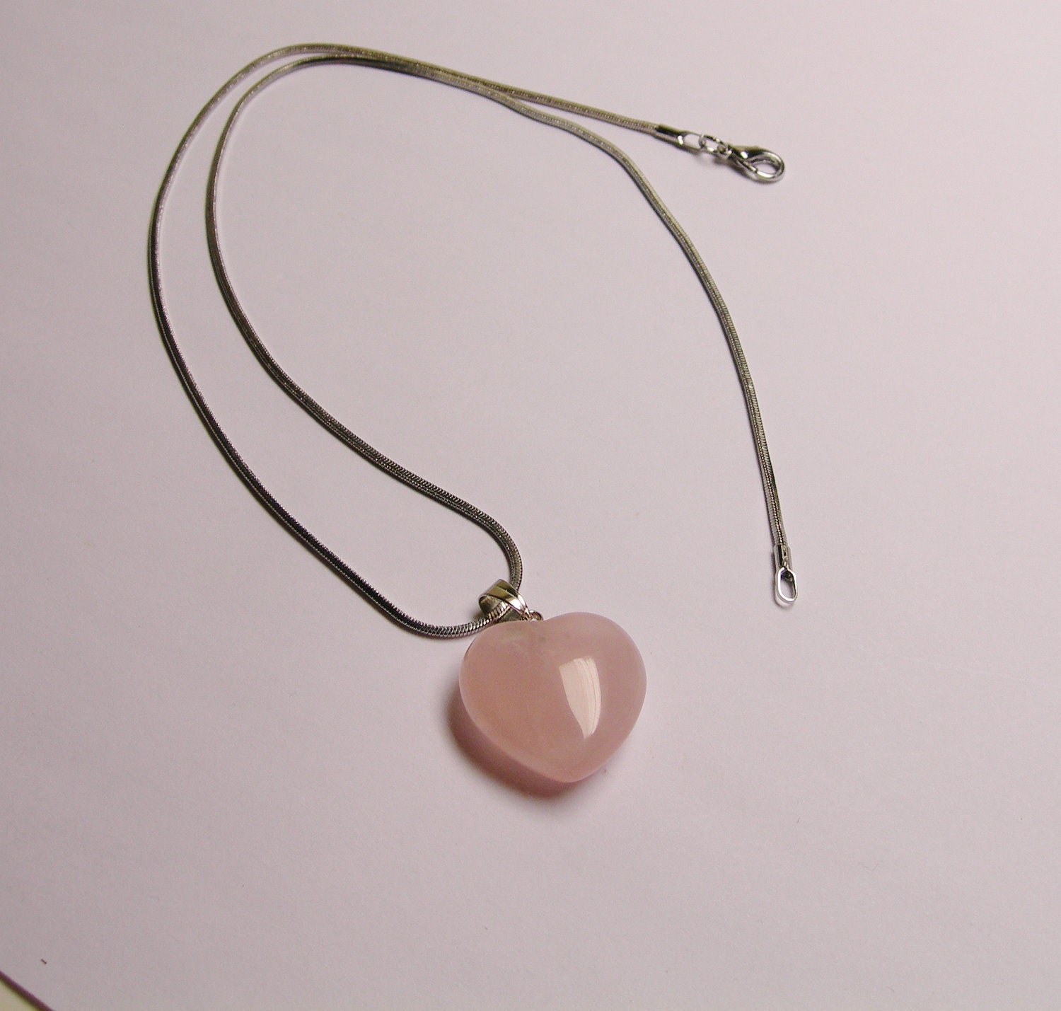 rose quartz heart necklace meaning