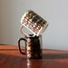 Vintage 60s Black and Cream Floral Ceramic Mugs