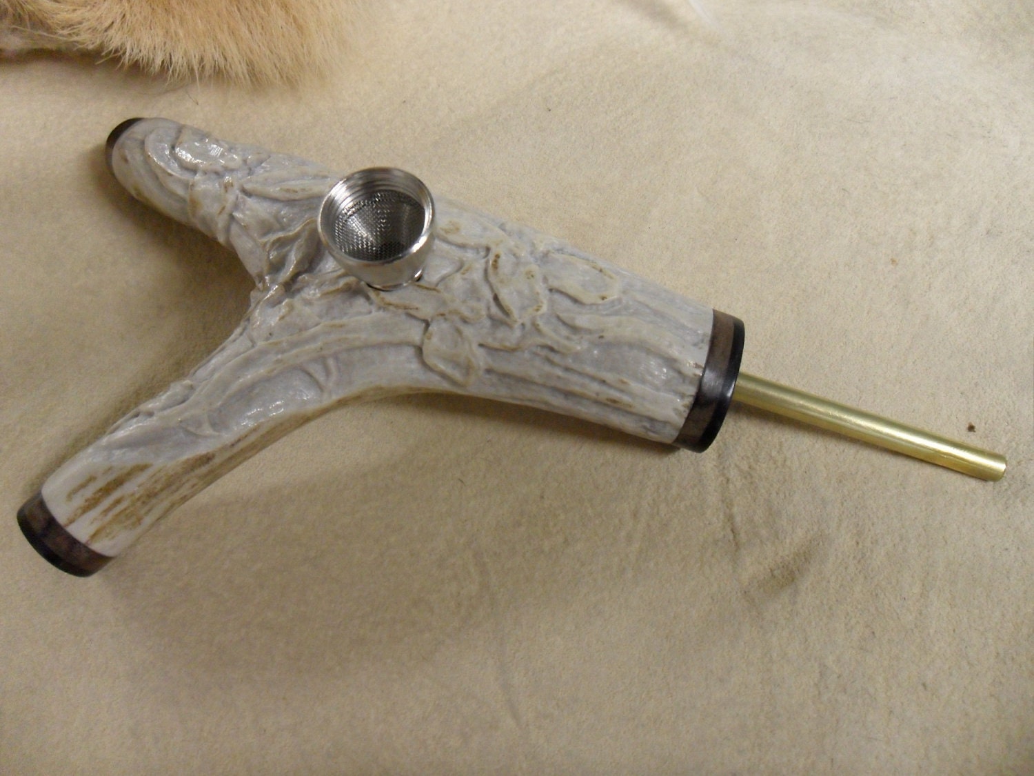 Custom made and carved deer antler pipe with ebony and