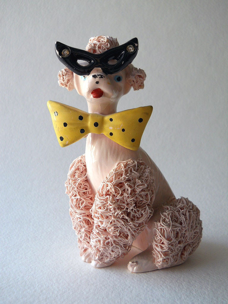 pink spaghetti poodle figurine