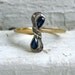Sweet Antique Sapphire and Diamond Bow Ring in 18K Yellow Gold/Platinum.