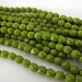 Czech Beads, Opaque Olive Green Firepolished 6mm Beads - 25 beads