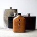 Vintage flask set / liquor bottles / instant collection / brown leather / rustic / masculine home decor / man cave / den decor / brown