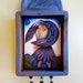 Raven's Shrine (rav001), in blue & purple. Image of woman w/ raven under a new moon, jade and lapis beads by Julie Higgins/Nansee New