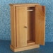 Unfinished dollhouse bedroom armoire or wardrobe. hinged doors brass nail knobs. Measures 4 3/4" x 3" x 1 1/4