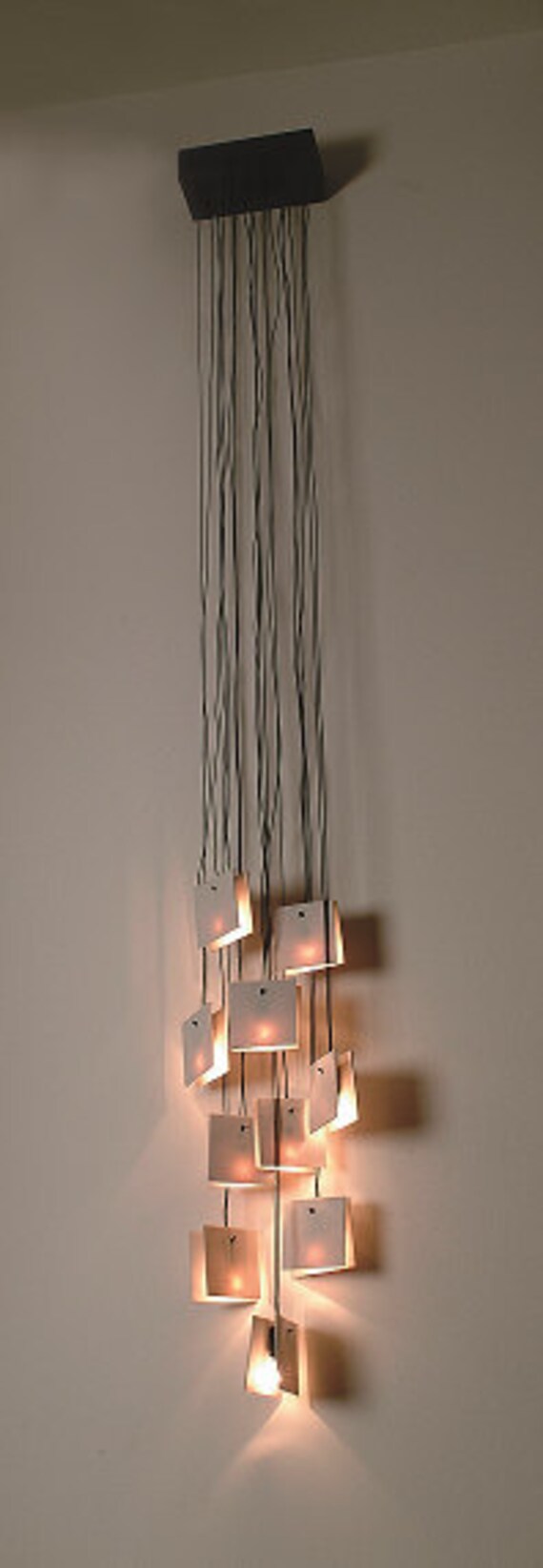 Items similar to Porcelain pads wall lamp on Etsy