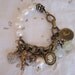 vintage repurposed jewelry charm bracelet pave heart cupid aquarius baroque pearl aquamarine butterfly clasp valentines gift