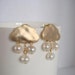 Gold cloud earrings with mother of pearl rain drops