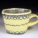 Yellow and Gray Ceramic Cup