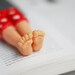 SALE! Macho bookmark. Red pants with white hearts. Legs in the book.
