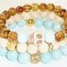 NEW-Wood Beaded Bracelet with Howlite Skull Charm and Baby Blue Dyed Jade Semiprecious Gemstone
