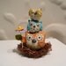 Three Owl Pile Up three owls stacked on each other