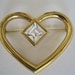 SALE 50 percent off Brooch Vintage Gold Tone Heart Shape with Large Rhinestone signed Givenchy