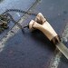 REAL coyote femur and musical quartz necklace