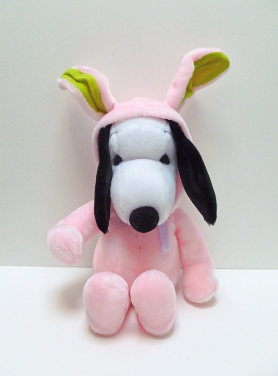 Cute Snoopy Plush Doll in Bunny Outfit.