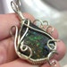 IRIDESCENT COLOR CHANGING Ammolite / Ammonite Fossil Stone Pendant Wrapped in 925 Sterling Silver Wire