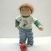 SALE 20 % Waldorf boy -12" boy, pants of blue denim, green and cream shirt with raccoon, made of natural materials