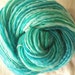 Surf and Seafoam. Hand spun, hand painted , Art yarn. Pure merino wool. Blues and greens..