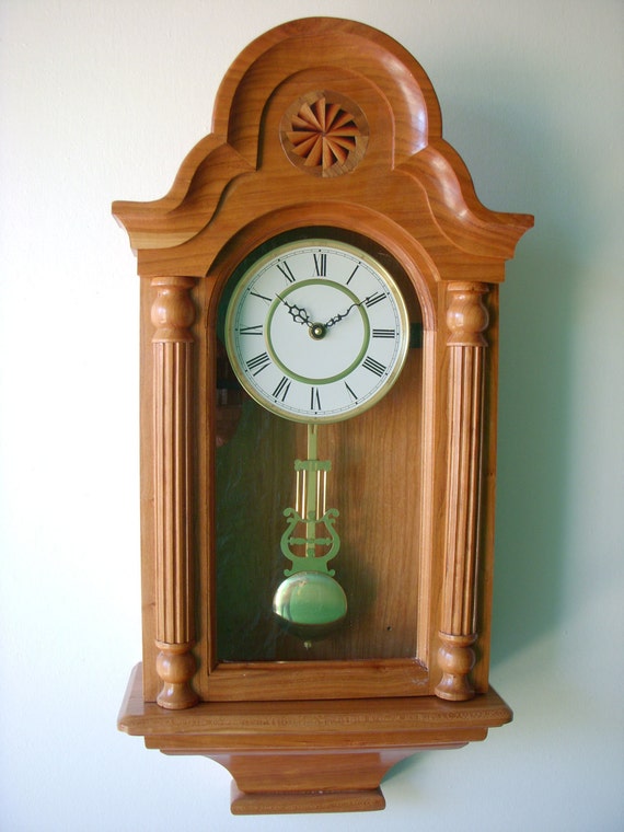 Items similar to Wooden wall clock, battery powered quartz pendulum