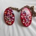 Vintage sweater clip- enamel on copper red with multi colored dots