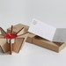 Hibachi Tealight Holder - a flat packable candle holder - with a RED tealight candle
