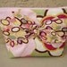 Cosmetic bag make up bag pink floral with bangle print tie front vinyl lined