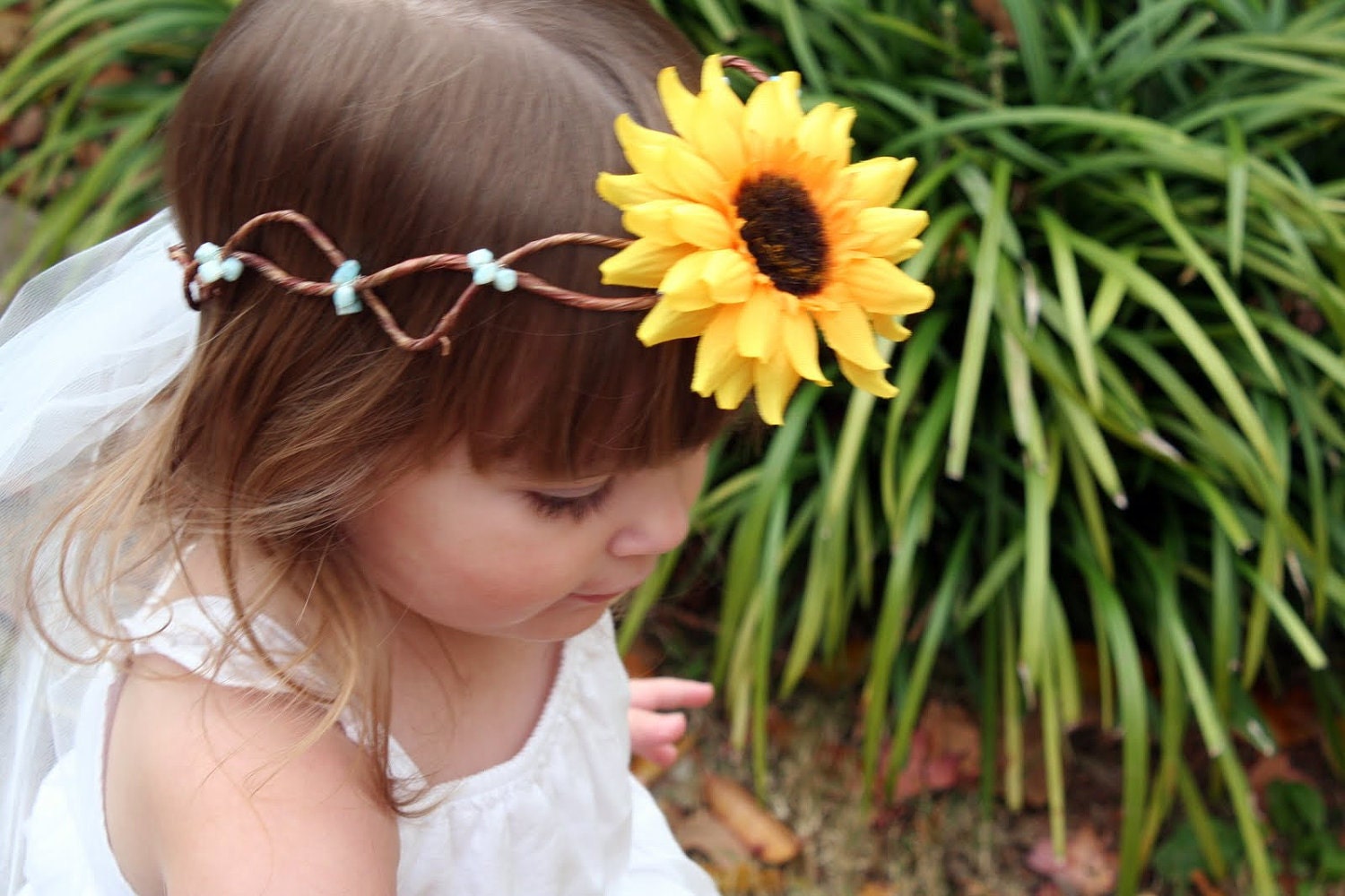 Sunflower Headdress with blue glass beads and tulle.