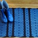 Handwoven Rug, Desert Rose, Blue on Black