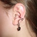 Pair of Hematite Ear Cuffs with Matching Whimsical Five Petal Flower Charms