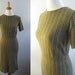 SALE 1960s striped day dress / vintage 60s black and gold wiggle dress
