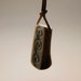Deer Antler, Carved Neolithic Spiral Pendant on Natural Leather.