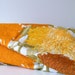 Vintage flower power curtains from the 70s - yellow, orange and golden flowers on white fabric