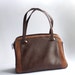 Small brown leather lady handbag