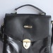 Black polished leather satchel