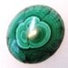 Malachite cabochon, hand cut and polished with bulls eye patterns