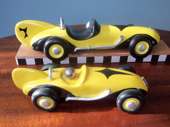 carved wooden cars