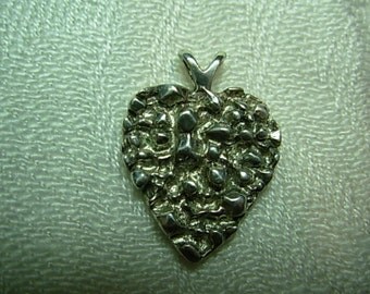Sterling silver pendant "goose bump" heart design.