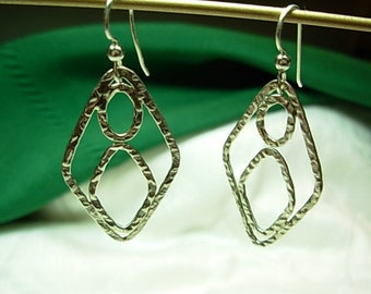 Sterling silver ( .925 ) dangling earrings.