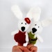 bunny finger puppets, crocheted pair of amigurumi rabbit, gift for easter, small stuffed animal puppet, beige, white red green