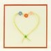 Love - Valentine card with scrap heart and crocheted little flowers in different colors and crocheted little green circle