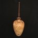 Turned figured maple vessel with walnut lid, lustrous cream and light brown coloration, hollow form
