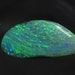 Solid Black Opal, Blue Green flash Lightning Ridge, 2.32 ct, 16.0mm x 7.8mm x 2.6mm