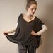 Black and white knit top with long sleeves
