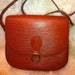 Vintage Louis Vuitton epi shoulder purse. Rare color of Brown