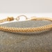 Brass Braided Bangle Bracelet - Gold Colored