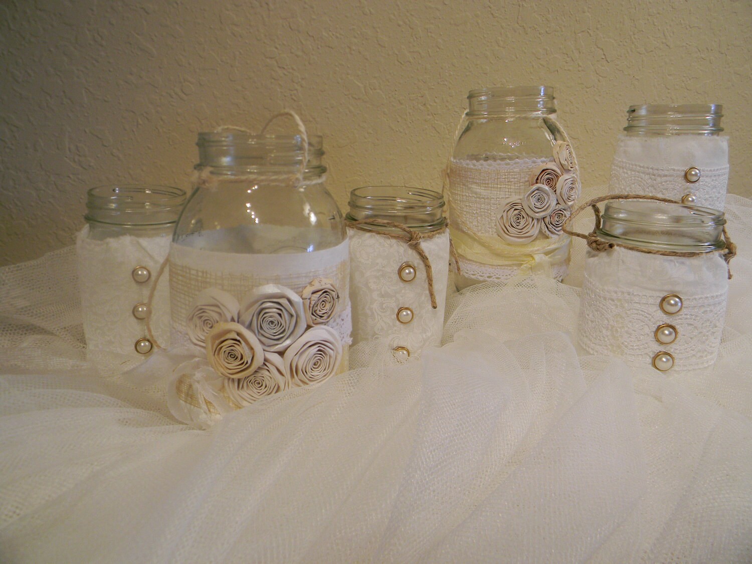 White upcycled mason jars/ wedding centerpieces