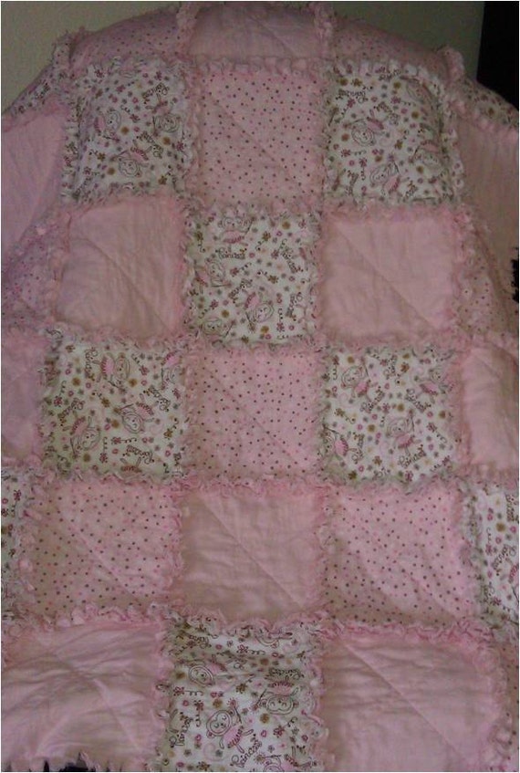 Items similar to Oldfashioned flannel rag quilt baby blanket crib size