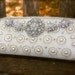 bridal clutch evening bag with rhinestone brooches can be a great gift for her bridal shower