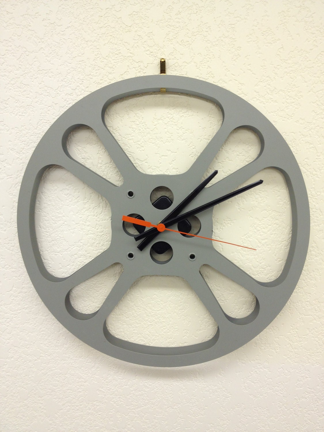 16mm Film Reel Wall Clock by ScrapIronDesigns on Etsy